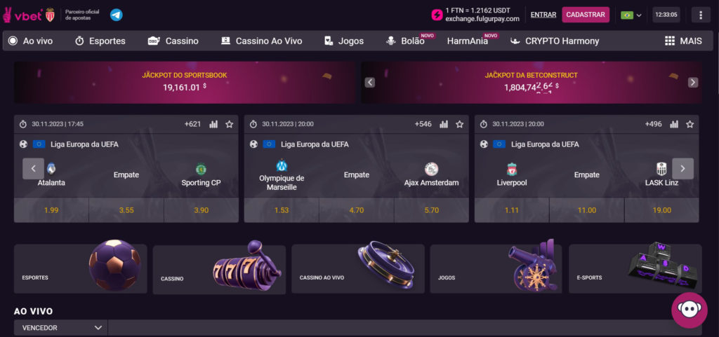 Site Vbet tem fundo em tons de roxo e abas de Esportes, Cassino, Cassino ao vivo, Jogos, E-sports, e muito mais